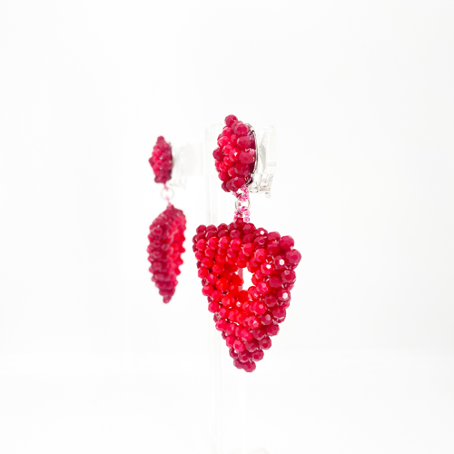 Aros de cristal rojo triangulares