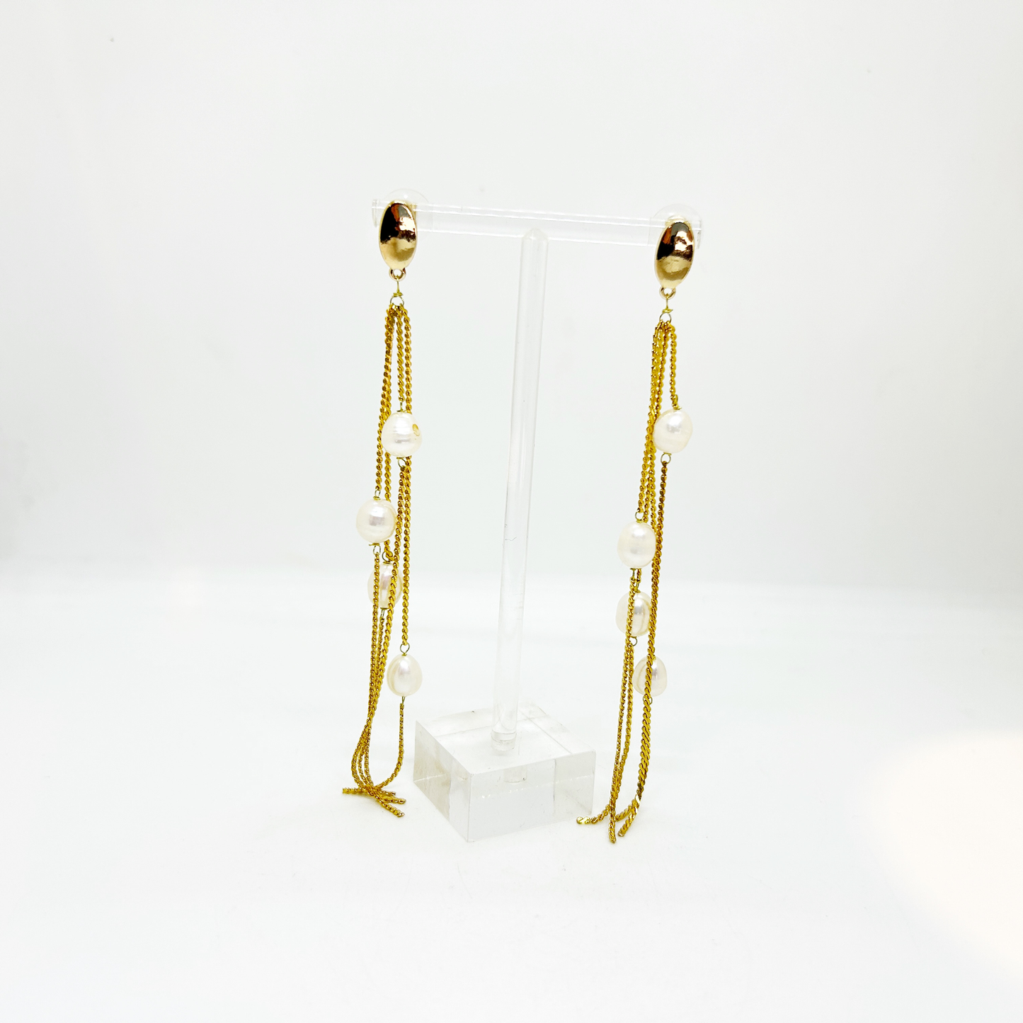 Aros largos cadenas y perlas
