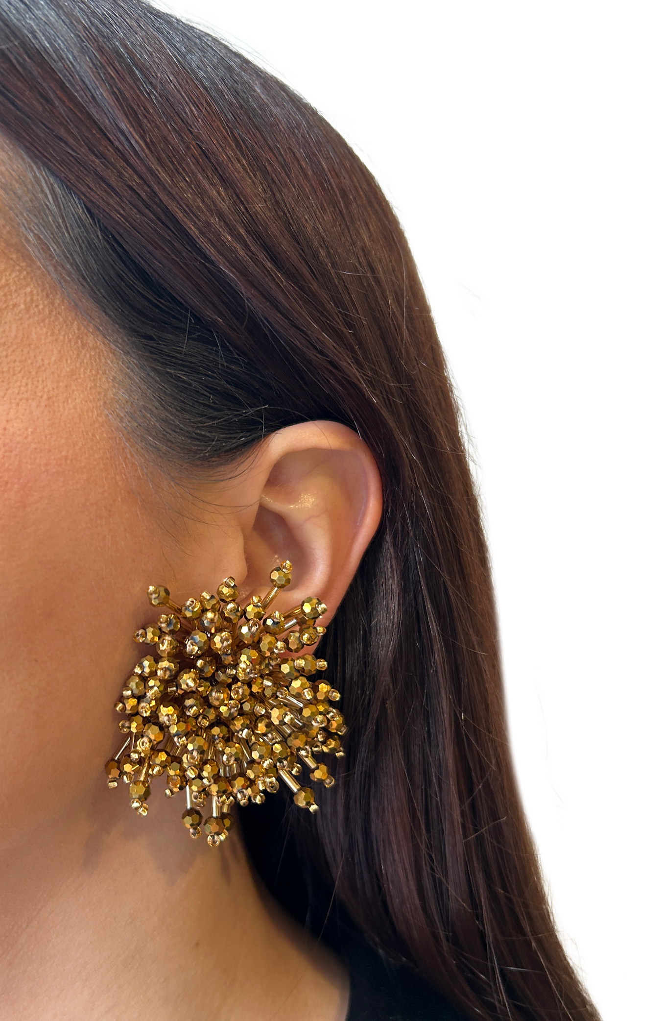 aros dorados de clip con cristales