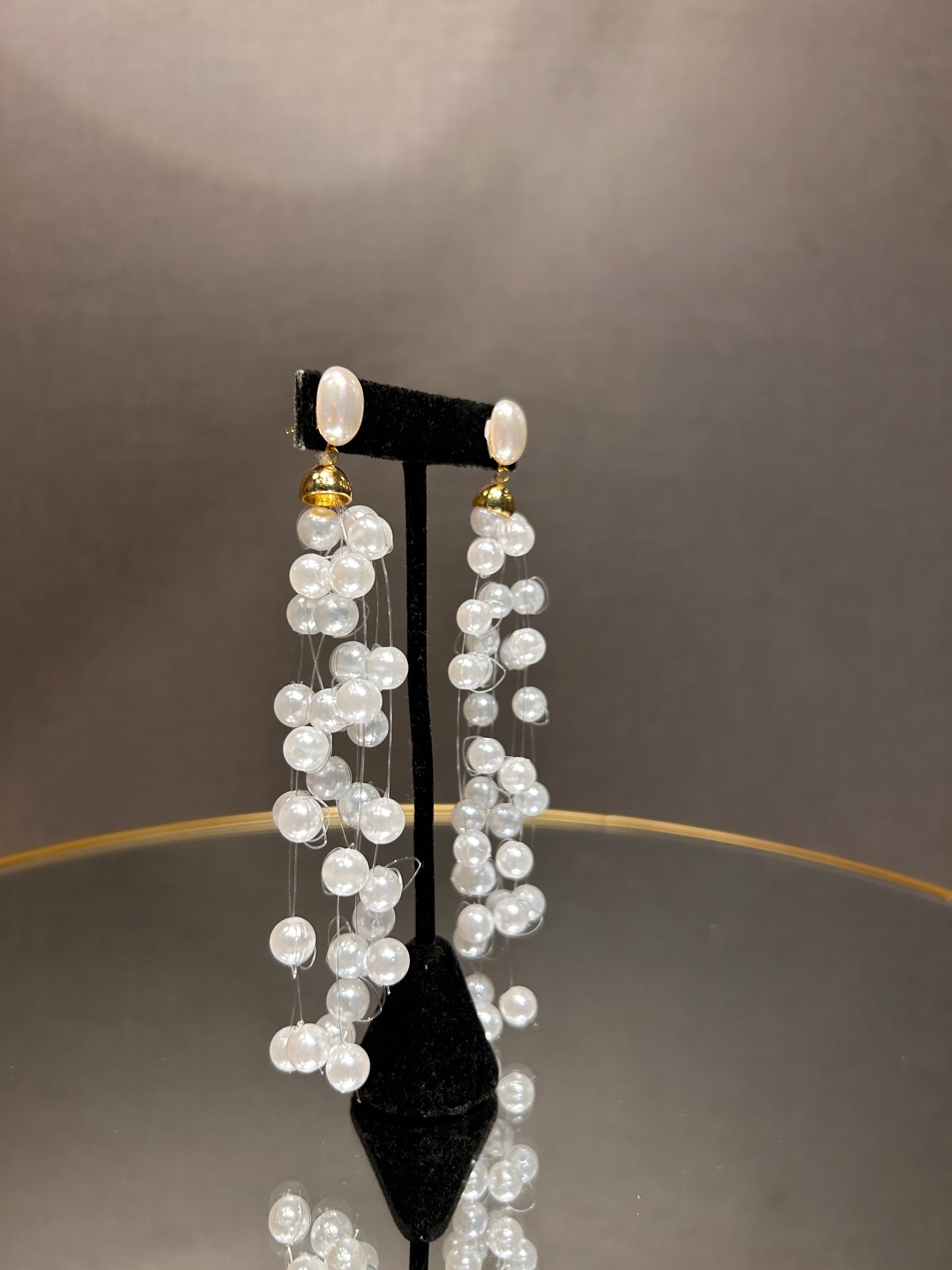 Aros largos mil perlas