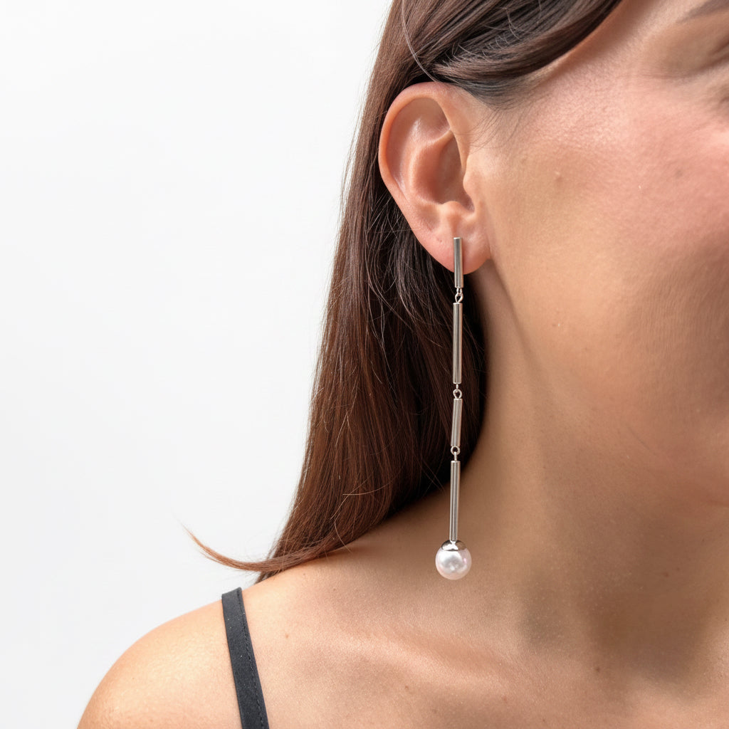 aros largos de metal con perla