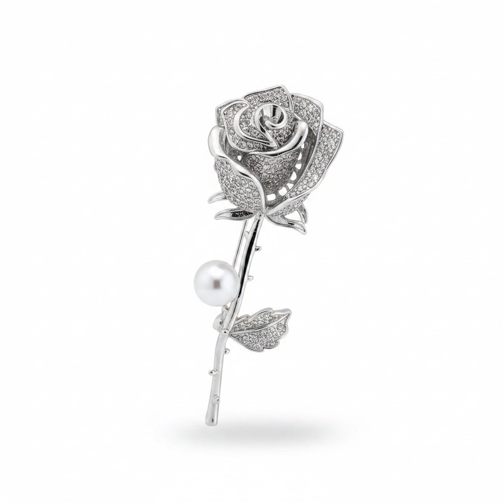 broche de rosa y zirconia