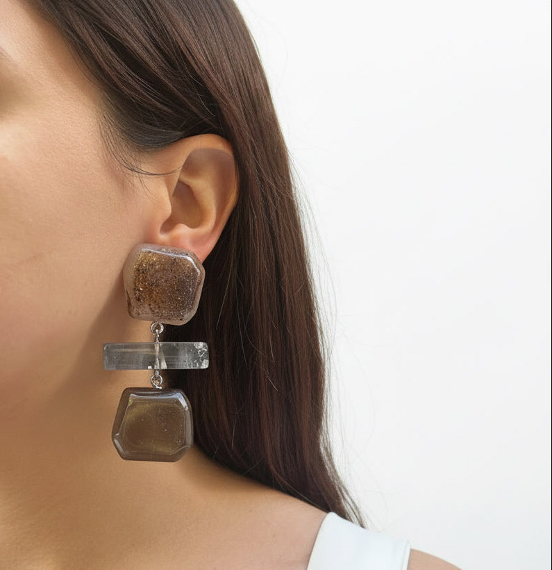 Aros de resina geométricos gris y visón