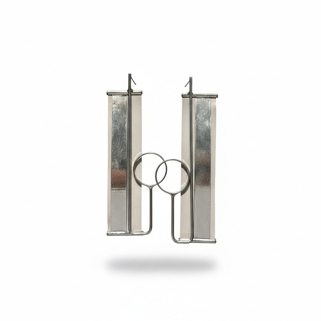 Aros girses y plateados