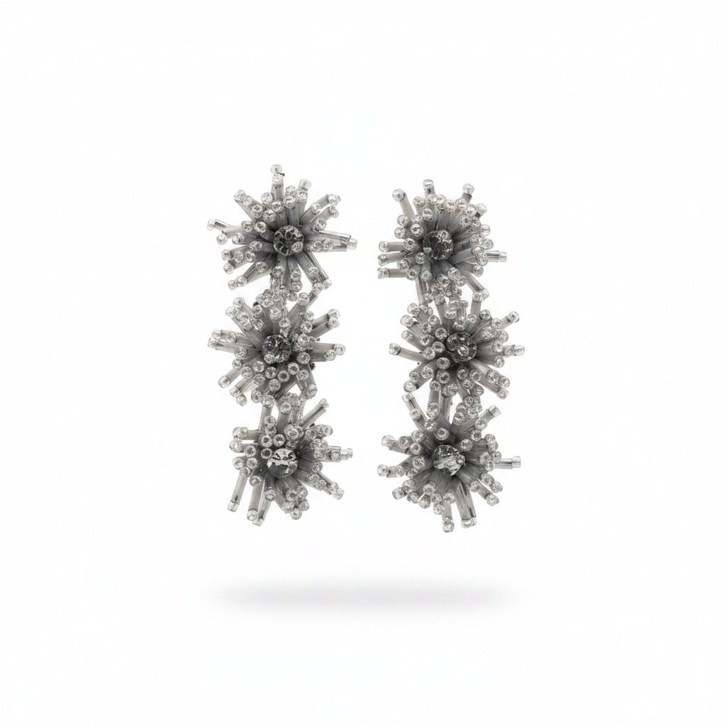 Aros triple flor plateado