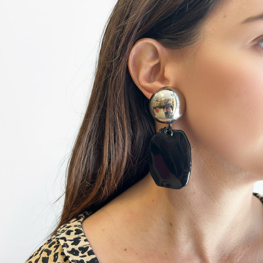 Aros negros y plateados