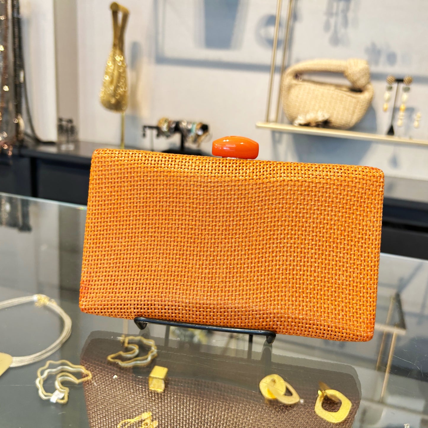 clutch naranja de rafia 