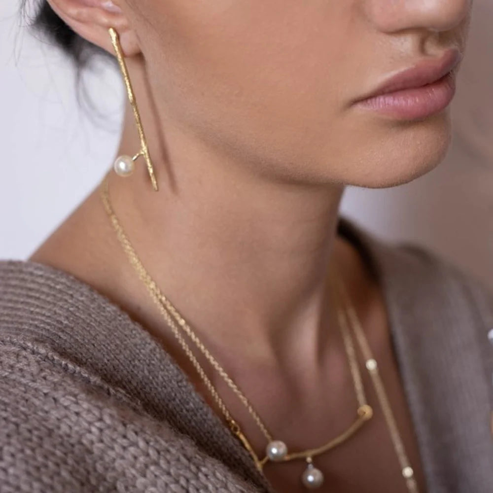 Aros rígidos con perla