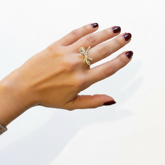 Anillo moño pequeño zircon