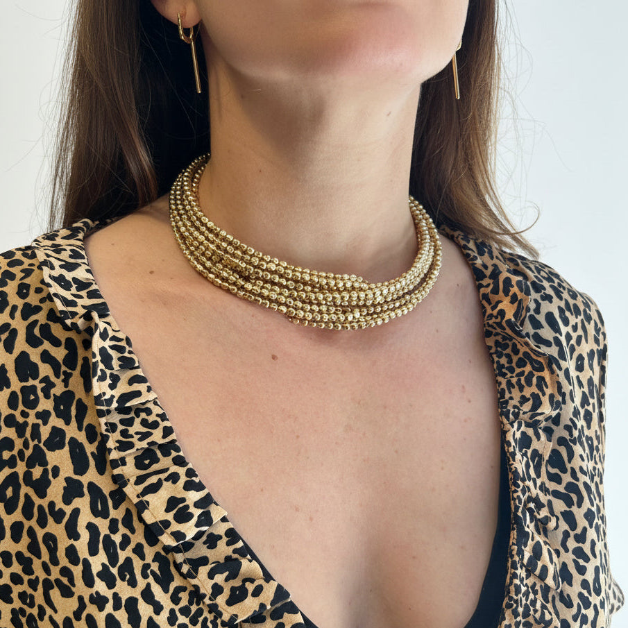 Collar dorado semi rigido
