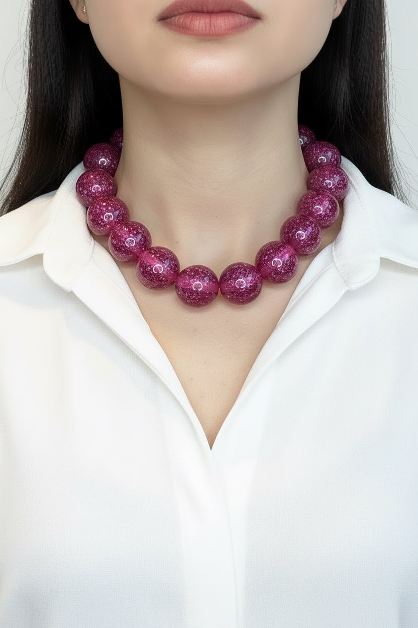 Collar esferas fucsia