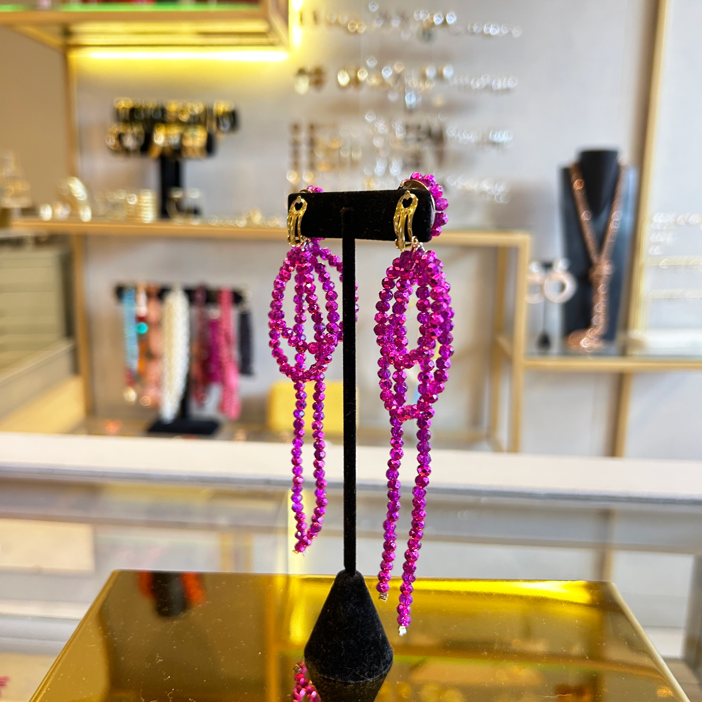 Aros largos fucsia