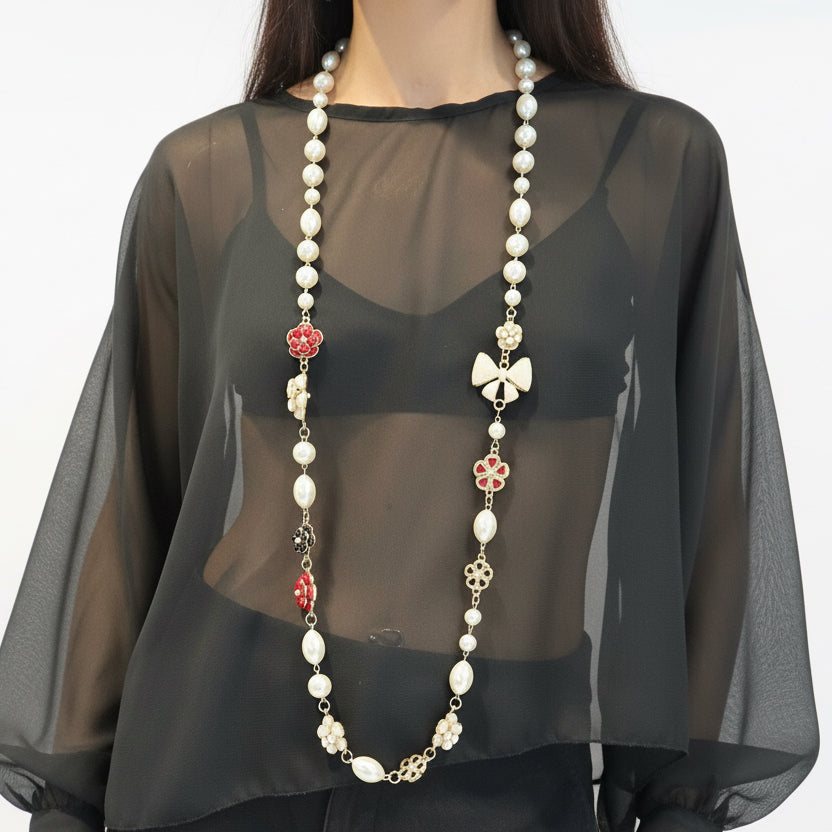Collar largo perlas y moños