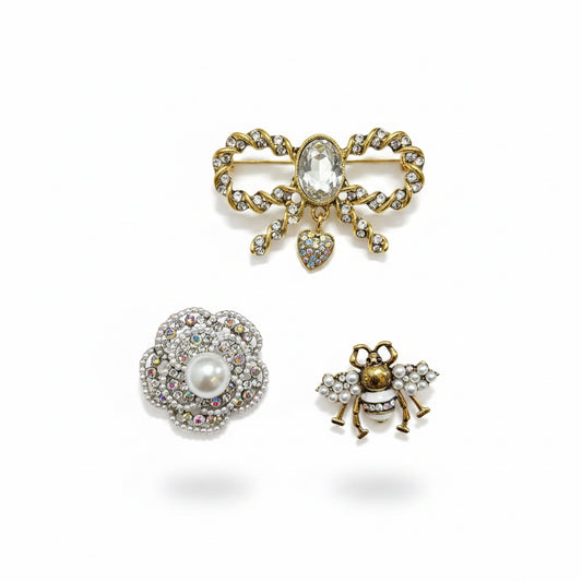 Conjunto broche moño mosca y flor