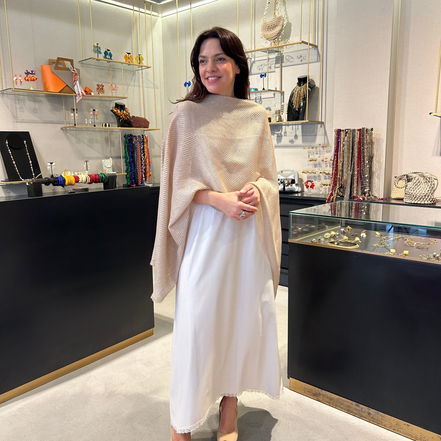 Poncho lurex plisado