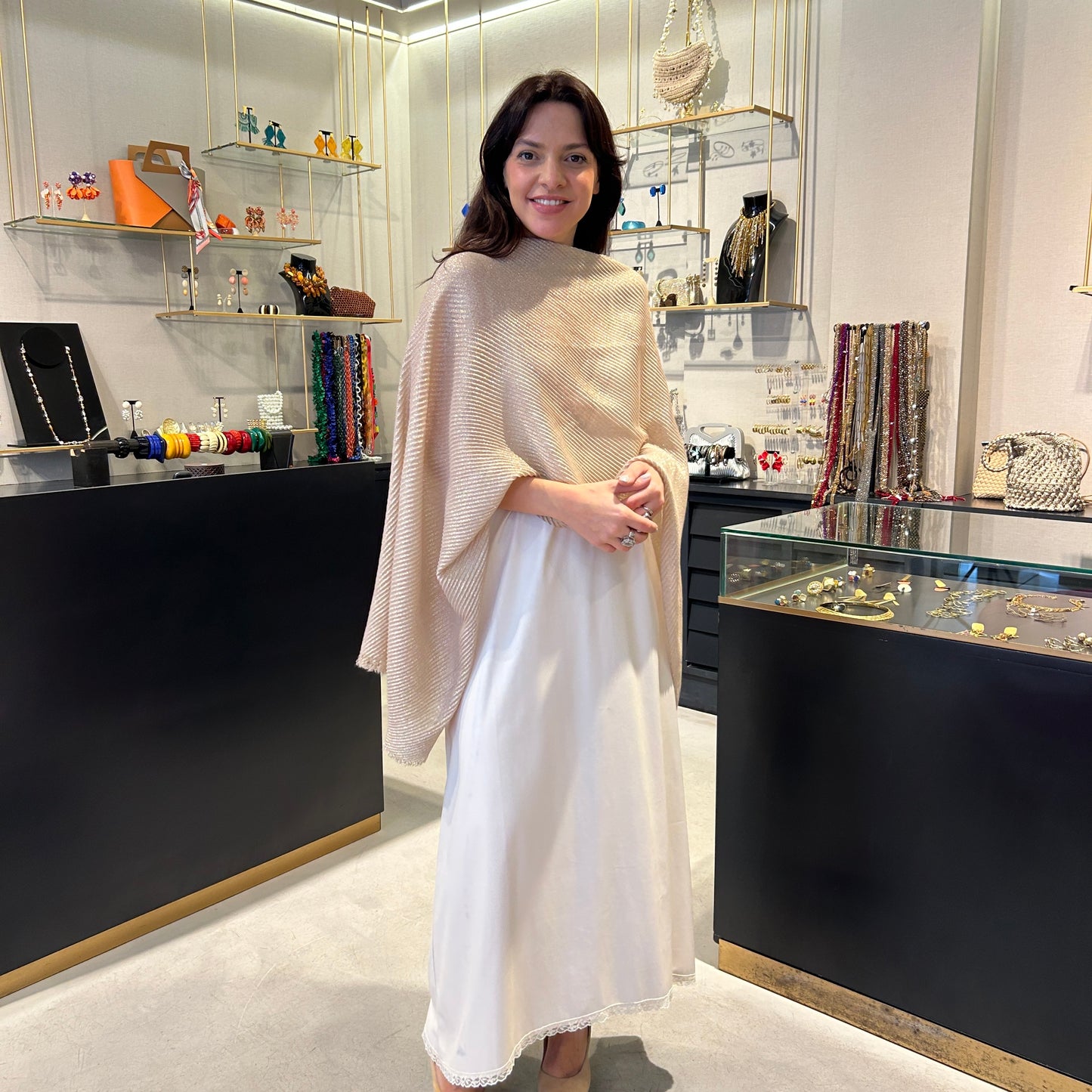 Poncho lurex plisado