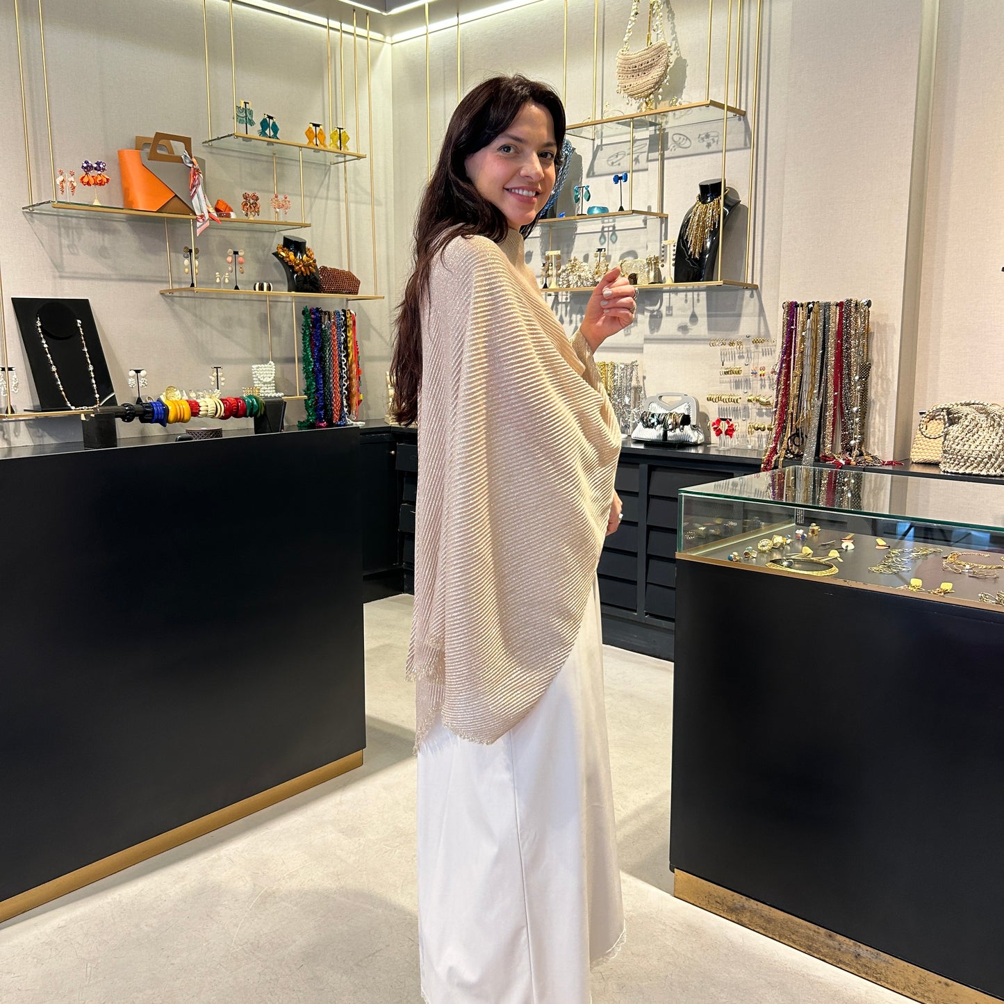 Poncho lurex plisado