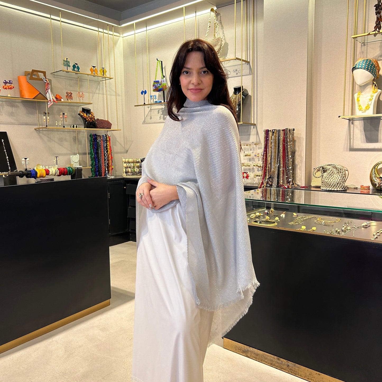 Poncho lurex plisado