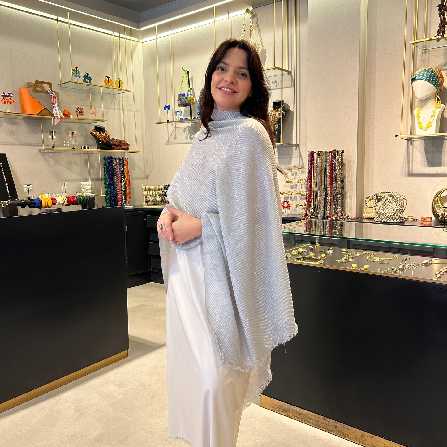 Poncho lurex plisado