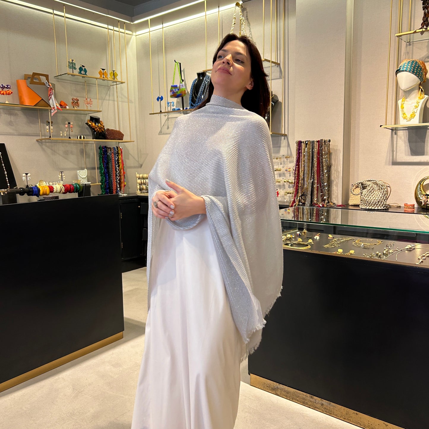 Poncho lurex plisado