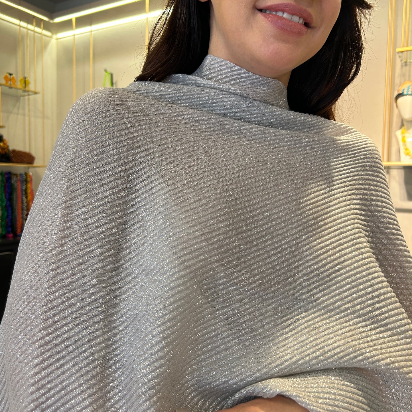 Poncho lurex plisado