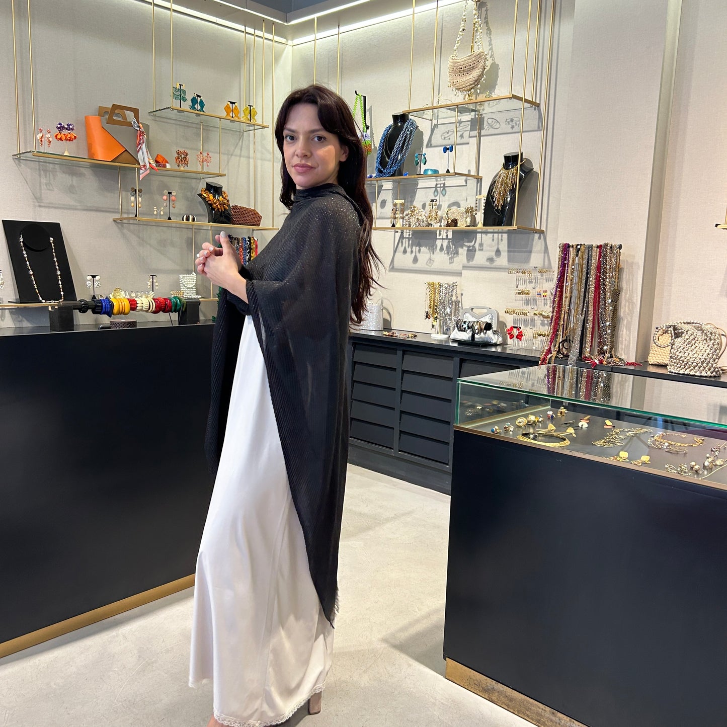 Poncho lurex plisado