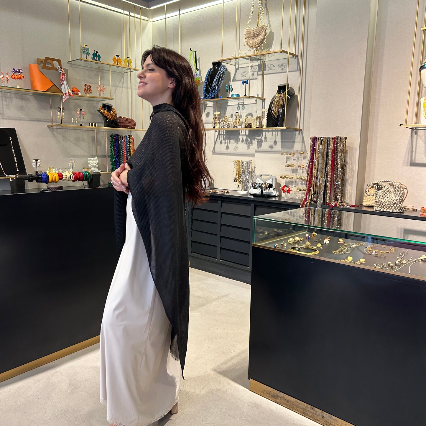 Poncho lurex plisado