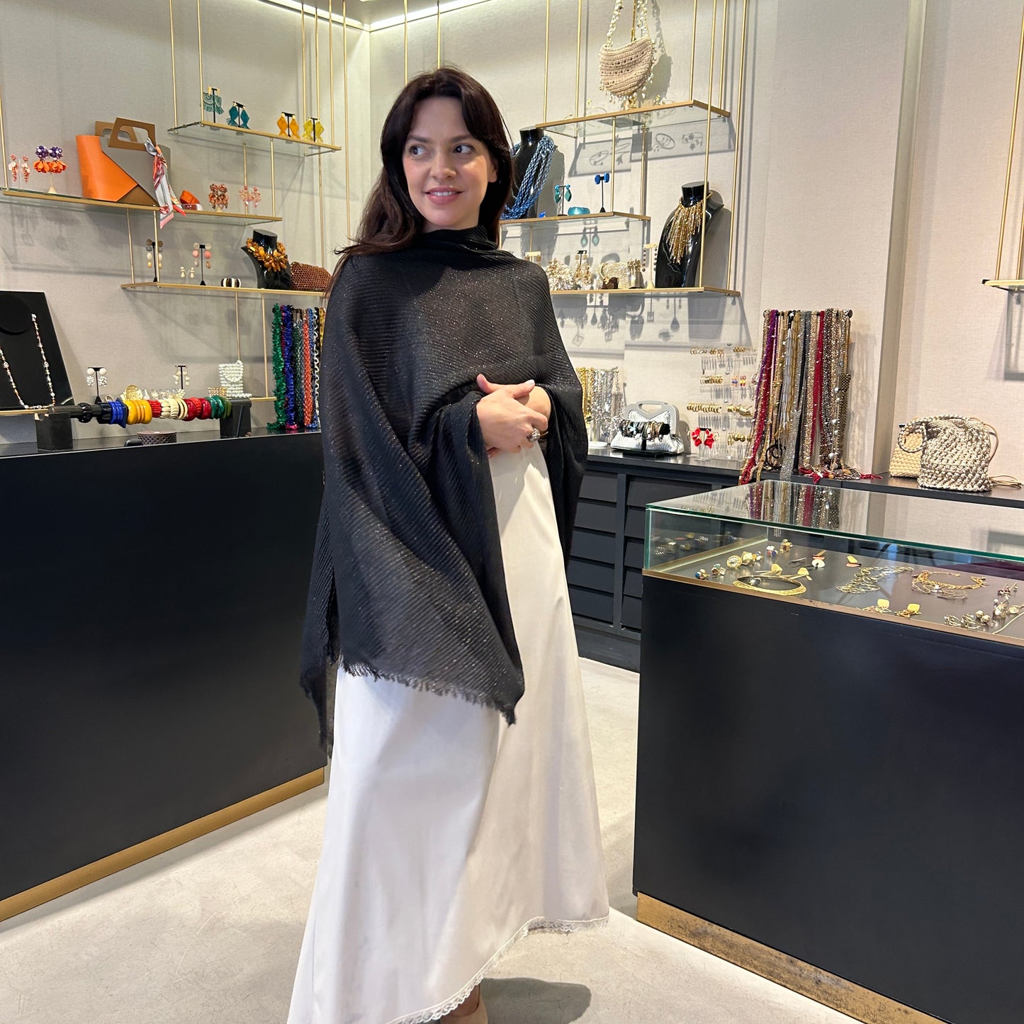 Poncho lurex plisado