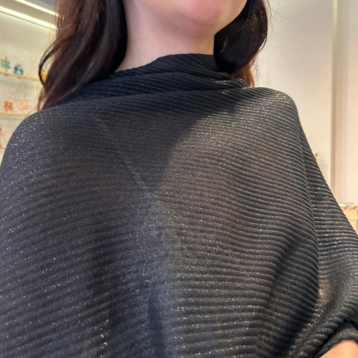 Poncho lurex plisado