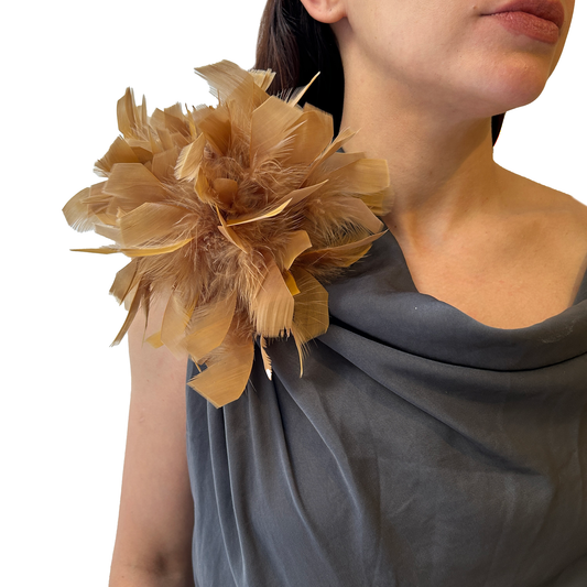 Broche plumas