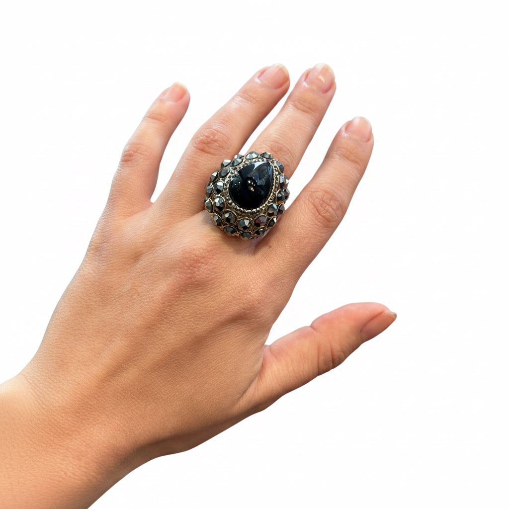Anillo negro y peltre