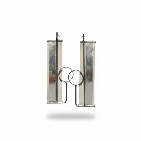 Aros girses y plateados