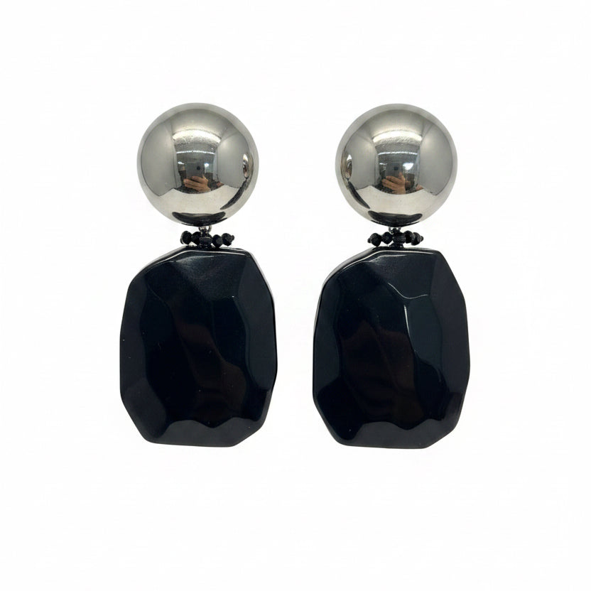Aros negros y plateados