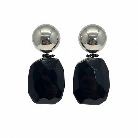 Aros negros y plateados