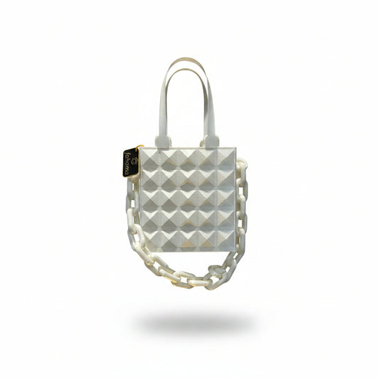 Bolso blanco tachas