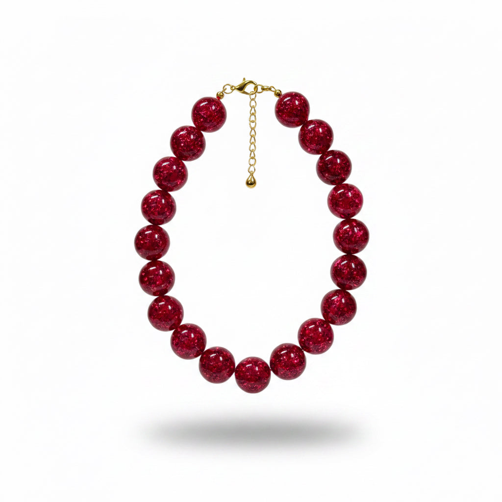 Collar esferas fucsia
