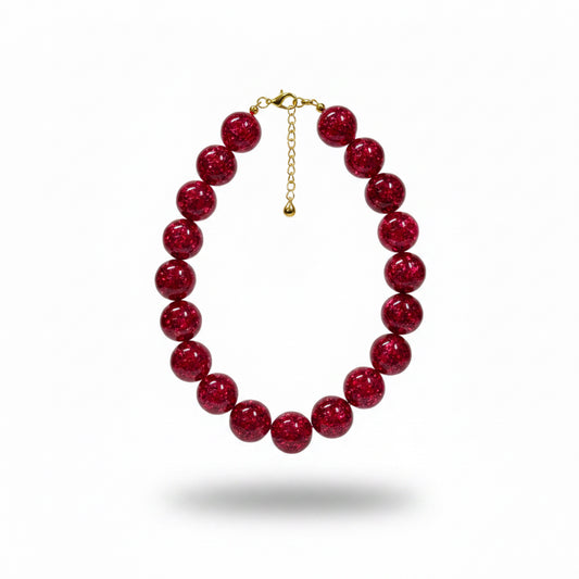 Collar esferas fucsia