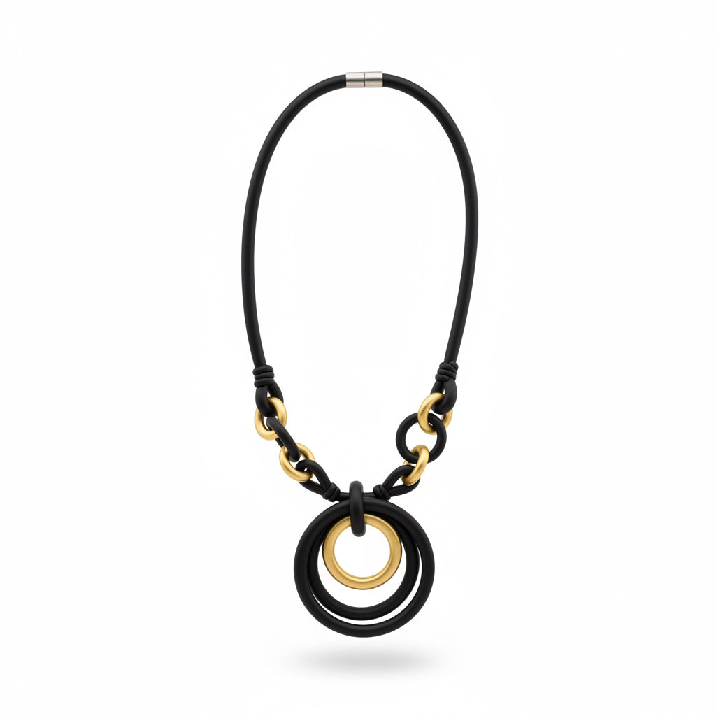 collar de caucho negro y dorado 